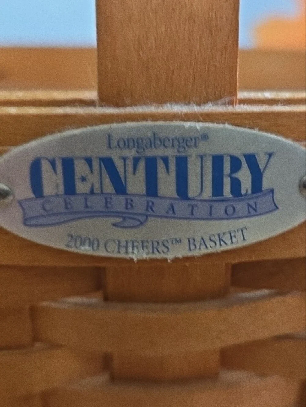 Longaberger woven basket with orange and yellow fall foliage